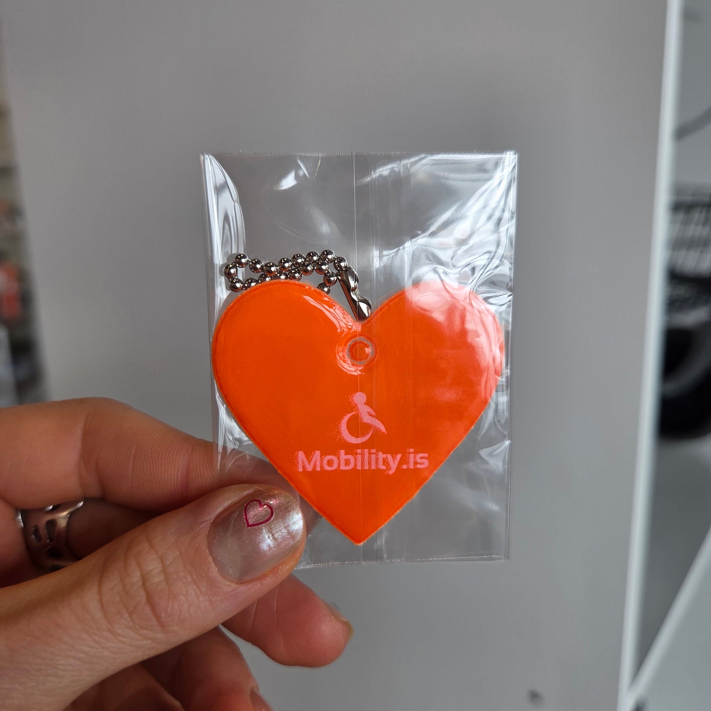 Appelsínugult endurskinsmerki