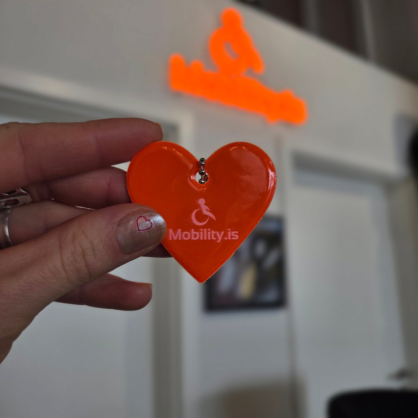 Appelsínugult endurskinsmerki